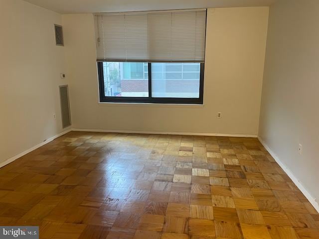 1301 20th St NW Unit 316, Washington, DC 20036 - unfurnished room featuring baseboards