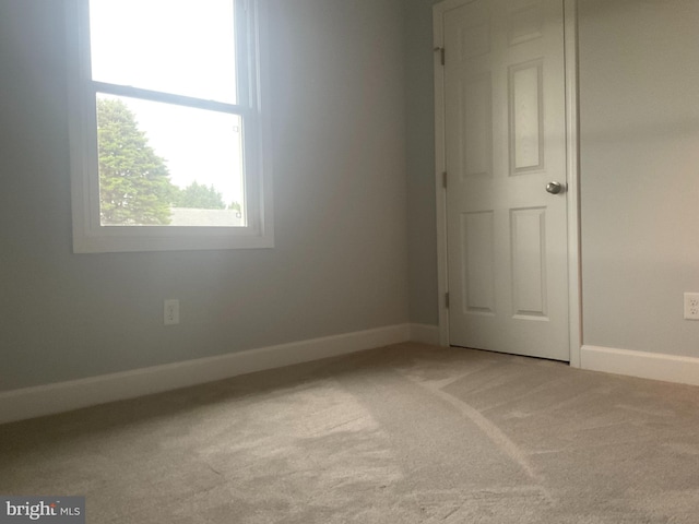 54 Bryan Dr, Rehoboth Beach, DE 19971 - empty room with baseboards and light colored carpet