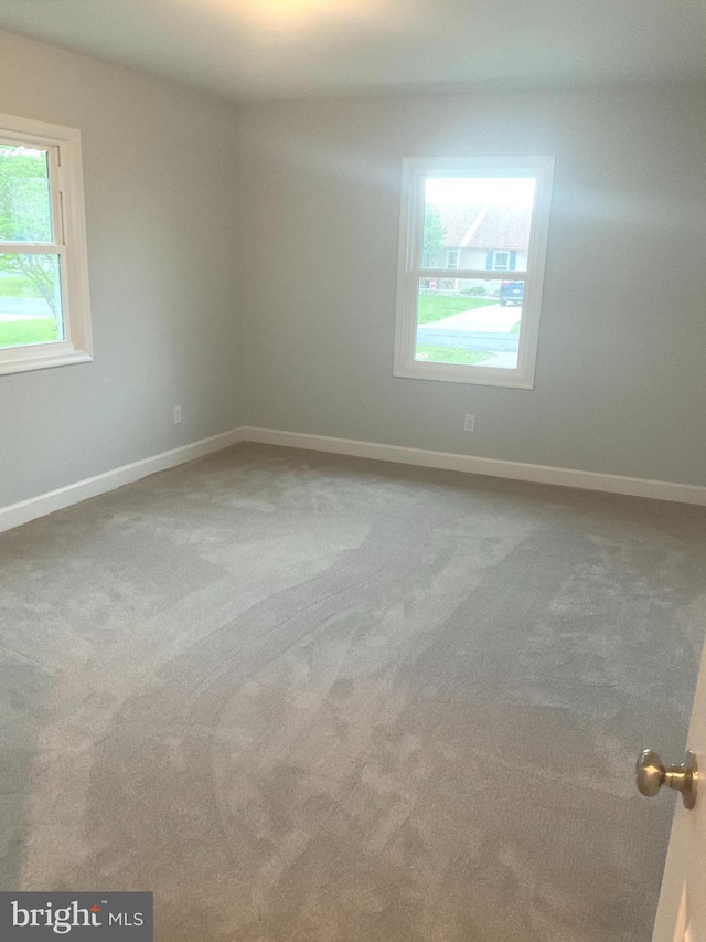 54 Bryan Dr, Rehoboth Beach, DE 19971 - carpeted empty room featuring baseboards