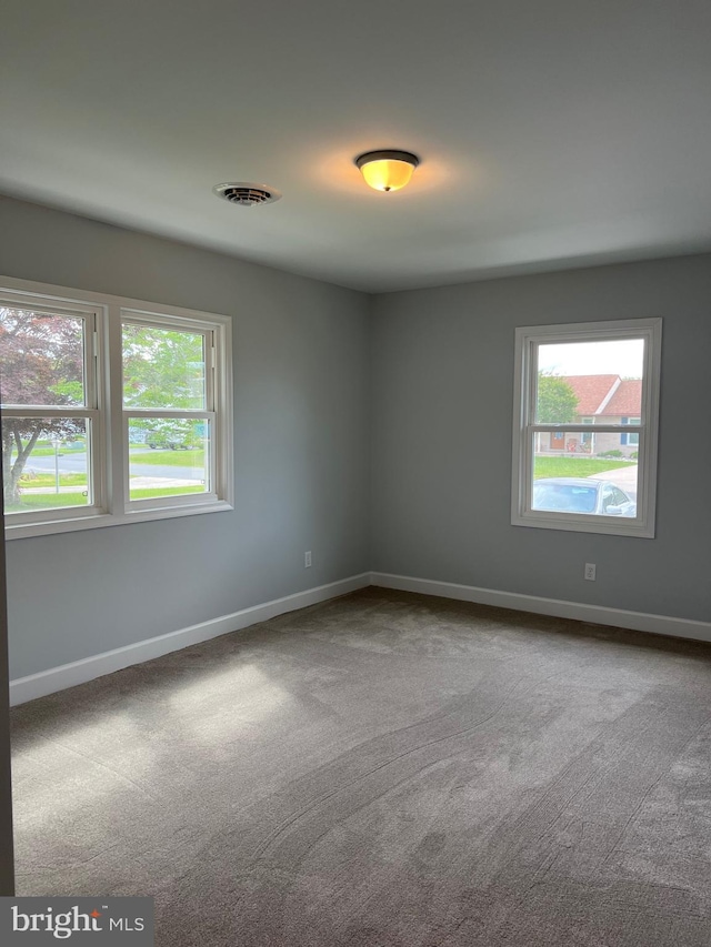 54 Bryan Dr, Rehoboth Beach, DE 19971 - spare room with carpet and baseboards