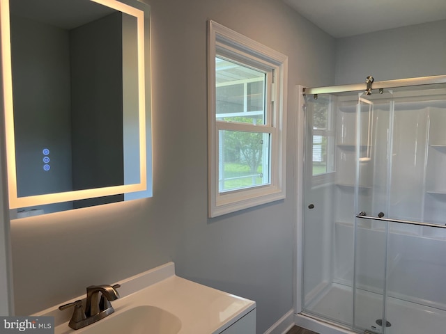 54 Bryan Dr, Rehoboth Beach, DE 19971 - bathroom with a stall shower and vanity