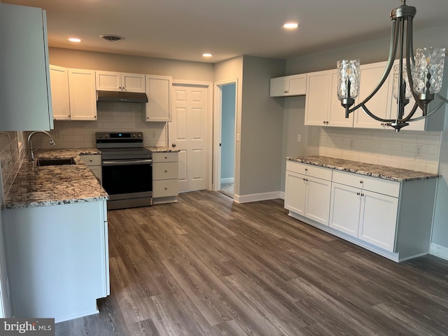 54 Bryan Dr, Rehoboth Beach, DE 19971 - kitchen featuring electric range, a sink, under cabinet range hood, backsplash, and baseboards