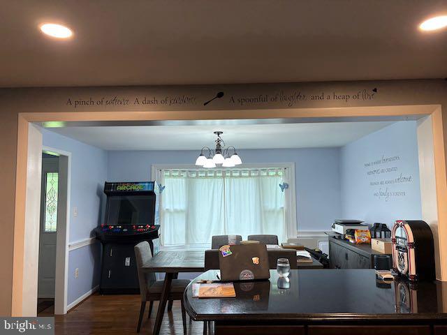 10282 Greystone Rd, Manassas, VA 20111 - dining area with plenty of natural light, a chandelier, wood finished floors, and recessed lighting