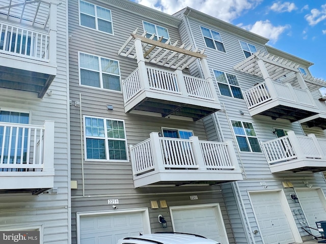 view of building exterior with an attached garage