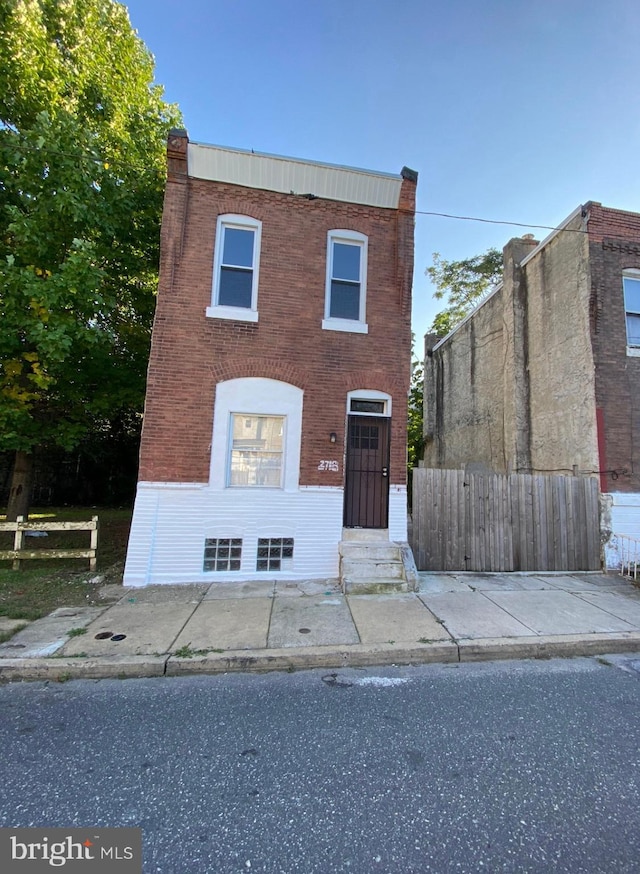 2718 W Sterner St, Philadelphia, PA 19132 - view of front of home with brick siding and fence