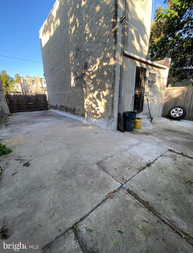 2718 W Sterner St, Philadelphia, PA 19132 - view of side of property with a patio and fence