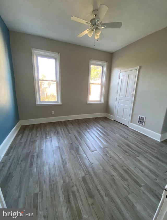 2718 W Sterner St, Philadelphia, PA 19132 - unfurnished room featuring ceiling fan, baseboards, visible vents, and wood finished floors