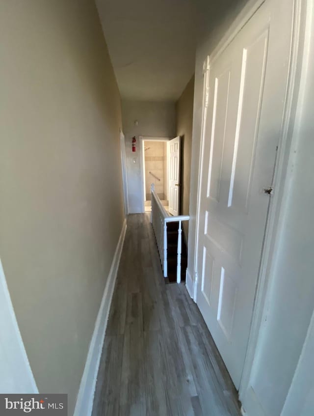 2718 W Sterner St, Philadelphia, PA 19132 - corridor with baseboards and dark wood finished floors