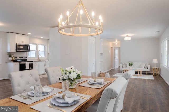 108 Wesley Chapel Dr, Edinburg, VA 22824 - dining area with a chandelier, wood finished floors, baseboards, and recessed lighting