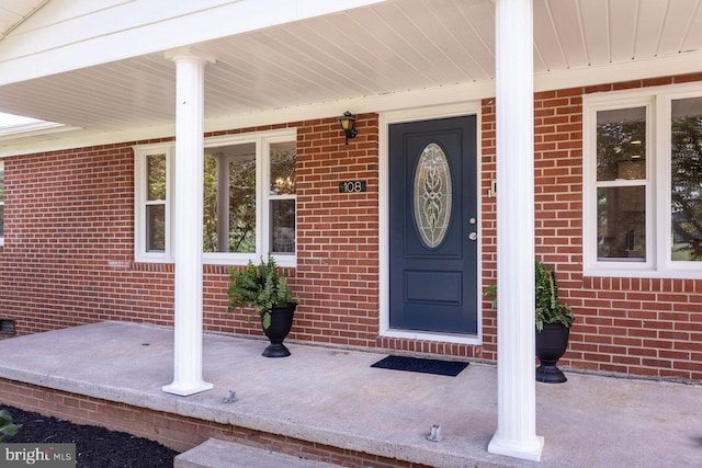 108 Wesley Chapel Dr, Edinburg, VA 22824 - entrance to property with a porch and brick siding