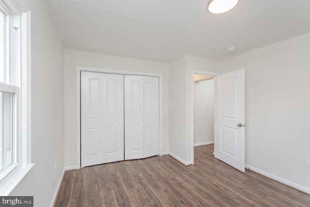 108 Wesley Chapel Dr, Edinburg, VA 22824 - unfurnished bedroom with baseboards, wood finished floors, and a closet