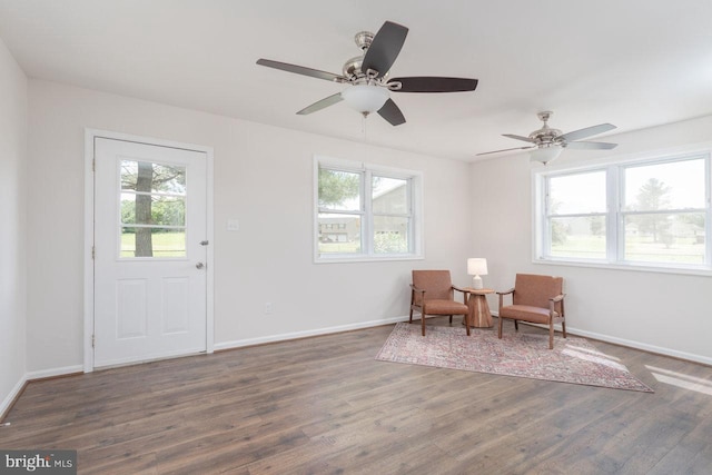 108 Wesley Chapel Dr, Edinburg, VA 22824 - sitting room with plenty of natural light, wood finished floors, and baseboards