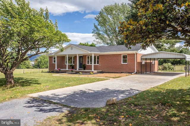108 Wesley Chapel Dr, Edinburg, VA 22824 - single story home with covered porch, brick siding, concrete driveway, and a carport
