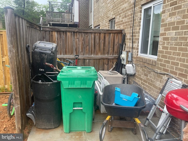 view of patio / terrace featuring fence