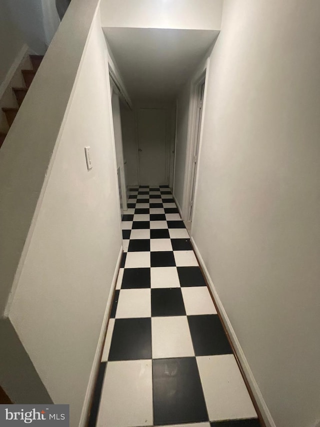 corridor with tile patterned floors