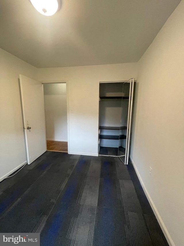 unfurnished bedroom featuring baseboards