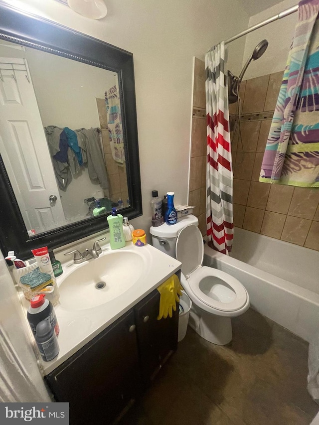 full bath with toilet, shower / bath combo, and vanity
