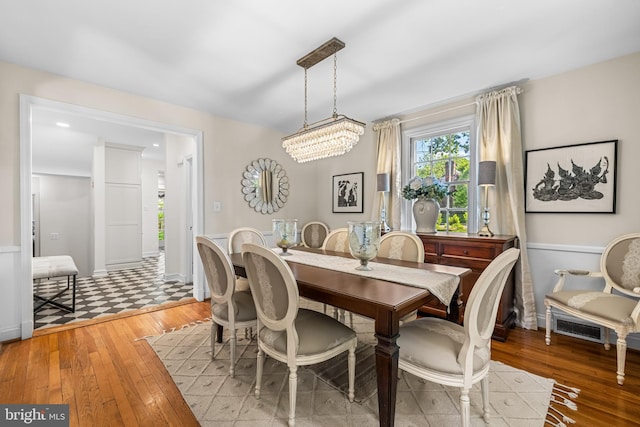 dining space featuring hardwood / wood-style floors