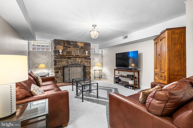 living area featuring a fireplace