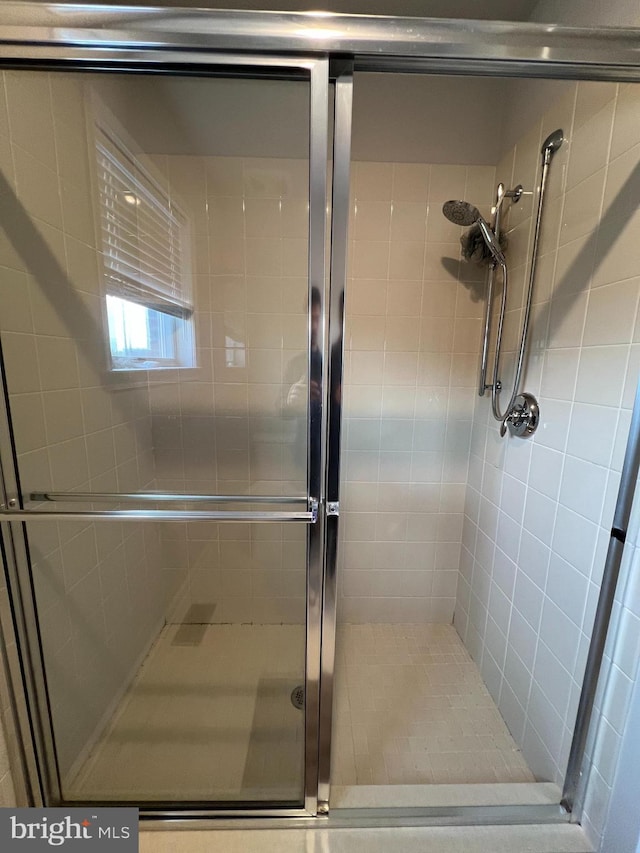 bathroom featuring a stall shower