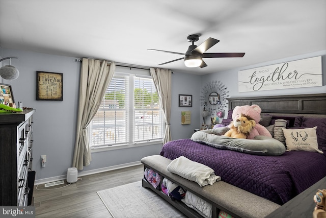 1694 Atkins Ave, Thorofare, NJ 08086 - bedroom with baseboards, wood finished floors, and ceiling fan