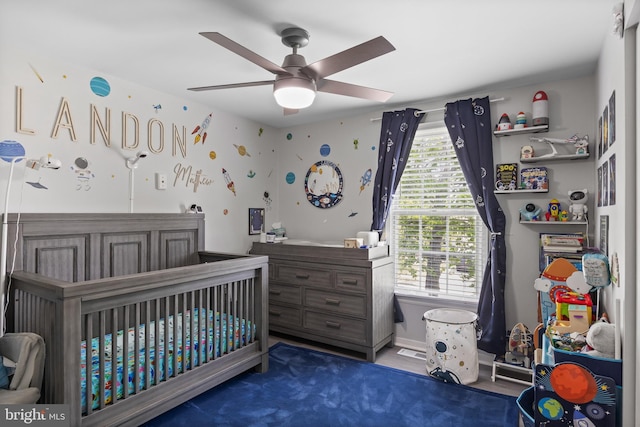 1694 Atkins Ave, Thorofare, NJ 08086 - bedroom with a crib and a ceiling fan