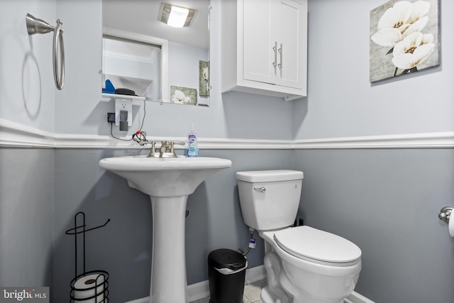 1694 Atkins Ave, Thorofare, NJ 08086 - bathroom featuring toilet, a sink, and baseboards