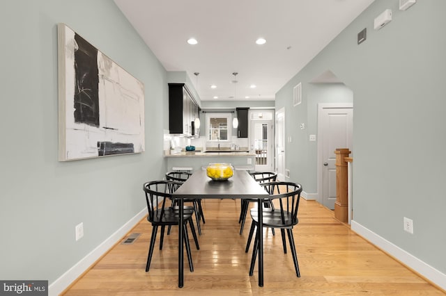 631 Regent Pl NE, Washington, DC 20017 - dining area featuring recessed lighting, light wood-style flooring, and baseboards