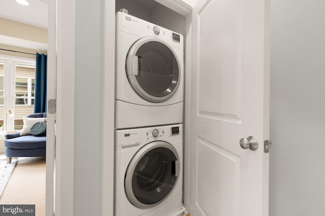 631 Regent Pl NE, Washington, DC 20017 - clothes washing area with stacked washer / drying machine