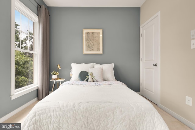 631 Regent Pl NE, Washington, DC 20017 - bedroom with light carpet and baseboards