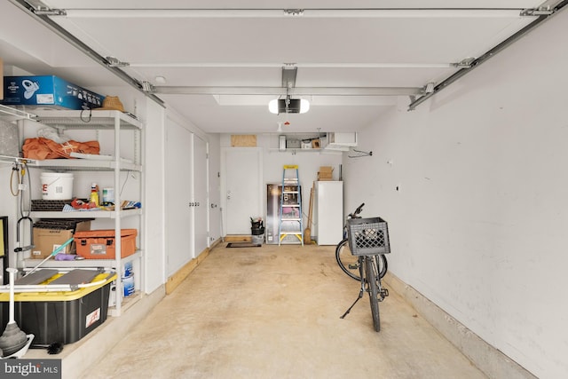 631 Regent Pl NE, Washington, DC 20017 - garage featuring a garage door opener and refrigerator
