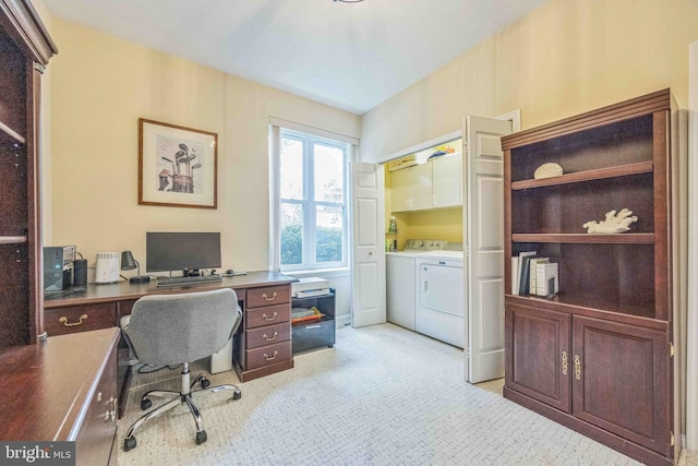 home office featuring independent washer and dryer and light carpet