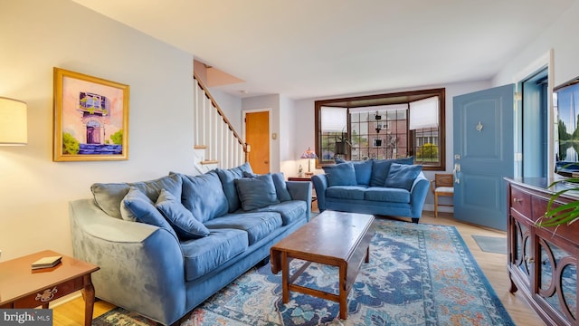 100 Lakeview Dr, Ridley Park, PA 19078 - living area with light wood finished floors and stairs