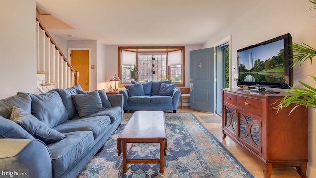 100 Lakeview Dr, Ridley Park, PA 19078 - living room featuring stairway and light wood-style flooring