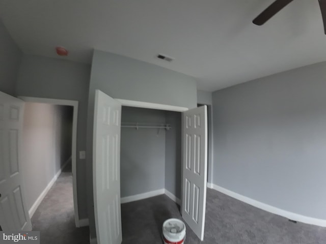 1632 Moreland Ave, Baltimore, MD 21216 - unfurnished bedroom featuring dark colored carpet, baseboards, and a closet
