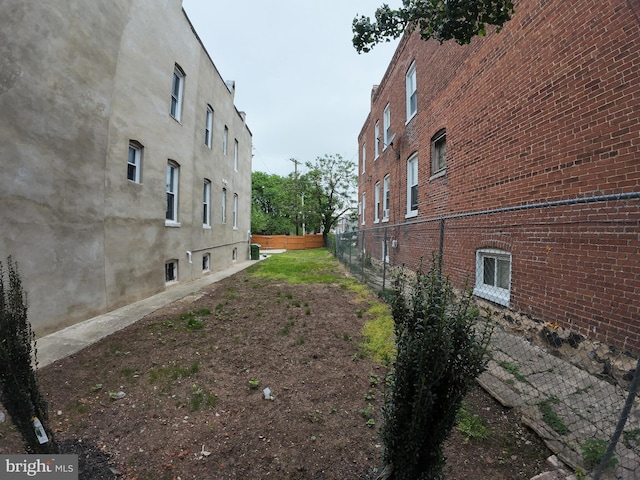 1632 Moreland Ave, Baltimore, MD 21216 - view of side of home featuring fence