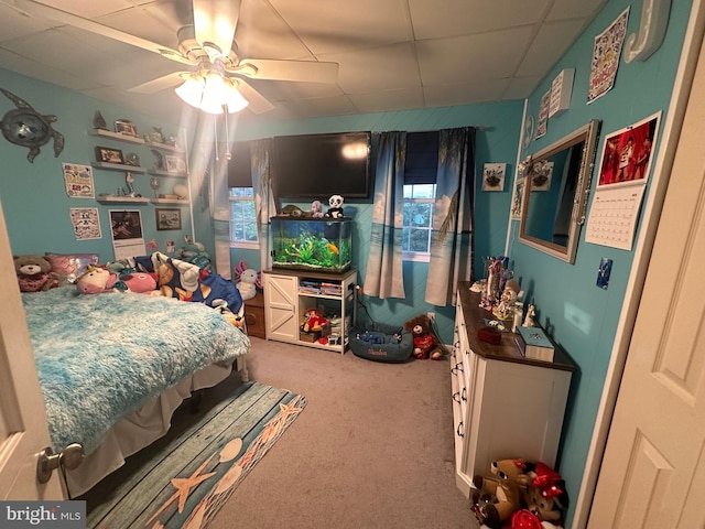 bedroom with ceiling fan and carpet