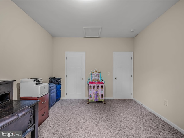 game room with light colored carpet, baseboards, and attic access