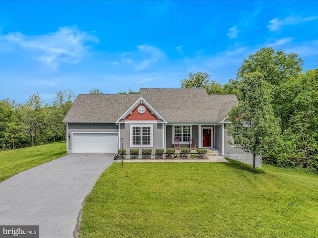 ranch-style home featuring asphalt driveway, a front yard, an attached garage, covered porch, and roof with shingles