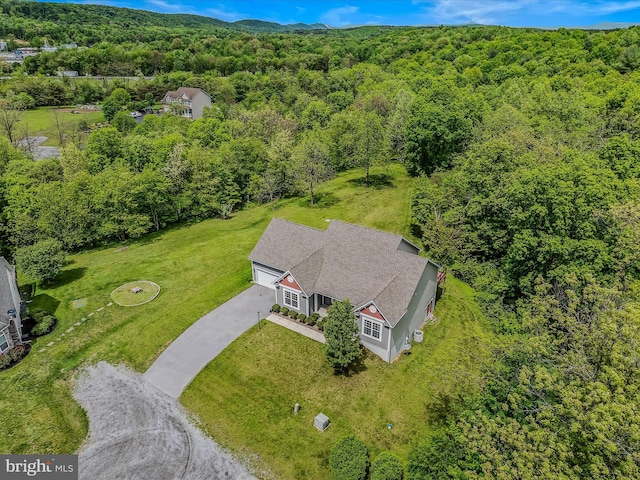 view from above of property featuring a forest