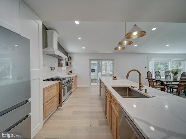 1782 Shaftsbury Ave, Crofton, MD 21114 - kitchen with a sink, appliances with stainless steel finishes, wall chimney exhaust hood, healthy amount of natural light, and recessed lighting
