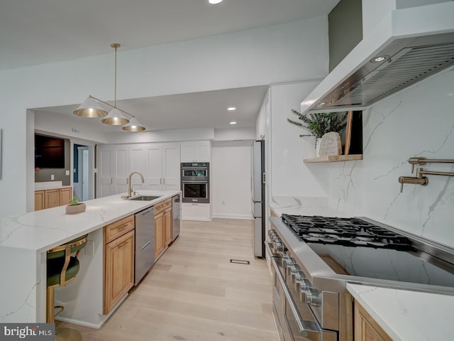 1782 Shaftsbury Ave, Crofton, MD 21114 - kitchen with wall chimney exhaust hood, stainless steel appliances, a sink, open shelves, and light wood-style floors