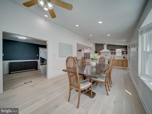 1782 Shaftsbury Ave, Crofton, MD 21114 - dining room featuring light wood-type flooring, ceiling fan, baseboards, recessed lighting, and radiator