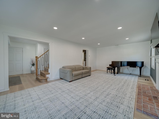 1782 Shaftsbury Ave, Crofton, MD 21114 - living area with baseboards, stairs, recessed lighting, and wood finished floors