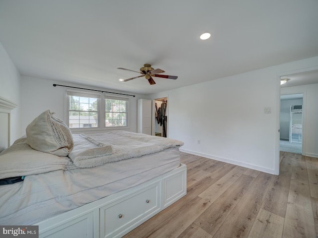 1782 Shaftsbury Ave, Crofton, MD 21114 - bedroom featuring light wood-style flooring, a walk in closet, baseboards, recessed lighting, and ceiling fan
