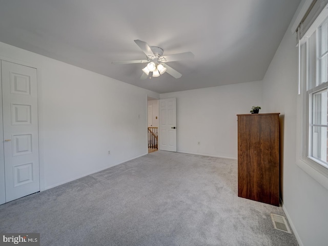1782 Shaftsbury Ave, Crofton, MD 21114 - unfurnished bedroom with carpet flooring, baseboards, and ceiling fan