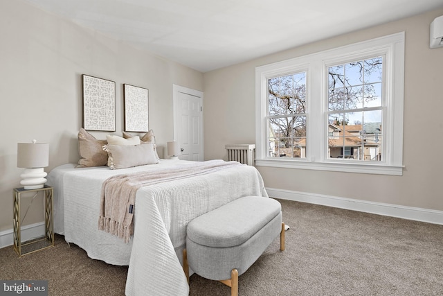 2903 Woodland Ave, Baltimore, MD 21215 - bedroom featuring dark carpet, a wall mounted air conditioner, and baseboards