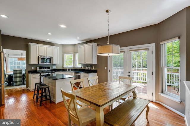 21591 Awbrey Pl, Broadlands, VA 20148 - dining room featuring light wood-style floors, baseboards, and recessed lighting