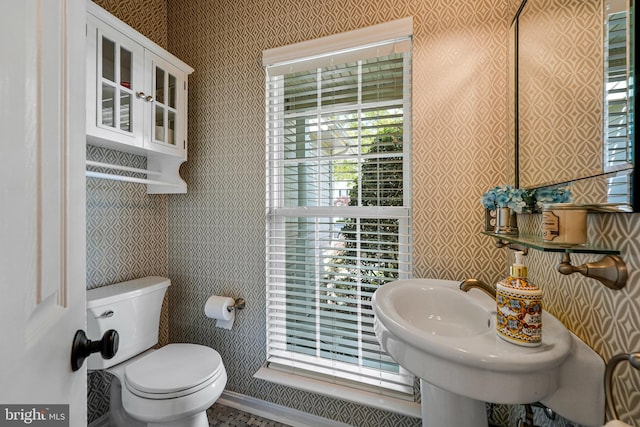 21591 Awbrey Pl, Broadlands, VA 20148 - half bath featuring wallpapered walls, toilet, and plenty of natural light