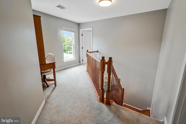 21591 Awbrey Pl, Broadlands, VA 20148 - corridor featuring an upstairs landing, light carpet, and baseboards